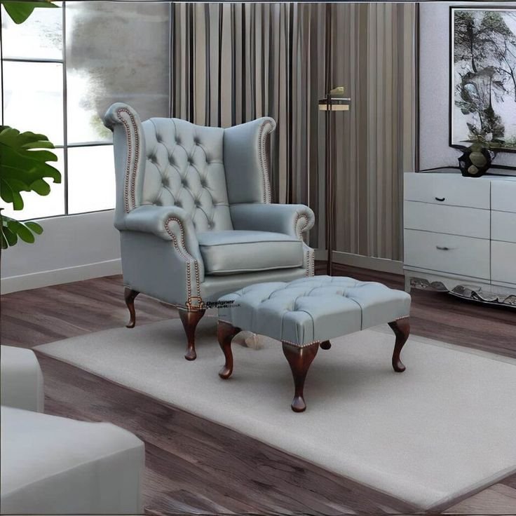 Vintage wing chair with leg rest